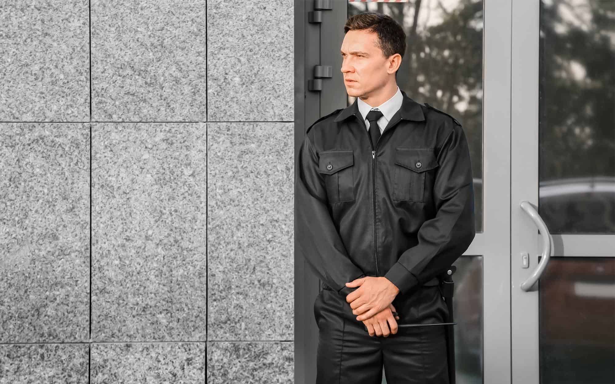 Front view of a security personnel standing guard