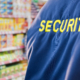 Side view of security guard in the supermarket