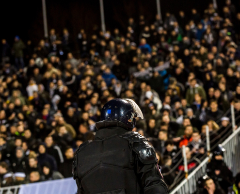 The police at the stadium event secure a safe match