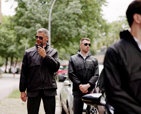 Executive protection team waiting outside
